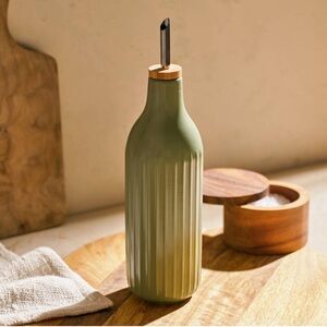 Thrive Market sage green oil and vinegar dispenser
